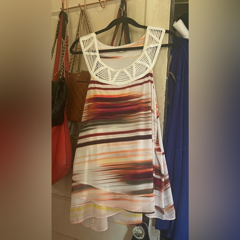 Sleeveless pullover top.